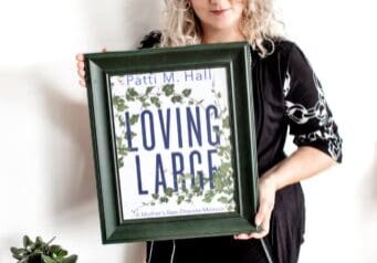 5S0A4750. holding framed LL jpg