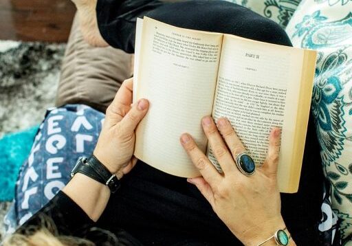 reading-on-couch-square-patti-m-hall-book-coach-memoir-writer